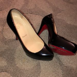 Christian Louboutin Red Buttoms in good condition